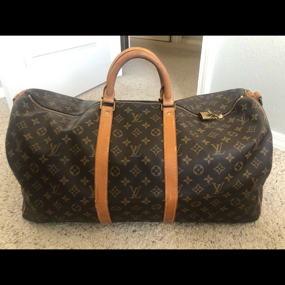 Auth Louis Vuitton duffle bag